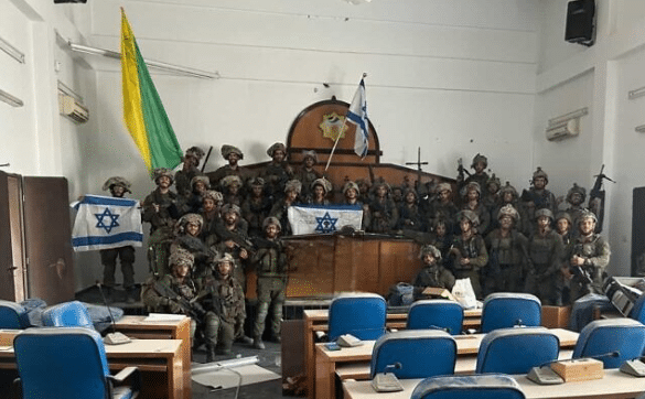 Soldiers from the IDF's Golani Brigade were photographed inside the parliament building of Gaza City, following their capture of the location on November 13, 2023. The photo, circulated on social media, is shared under Clause 27a of the Copyright Law.