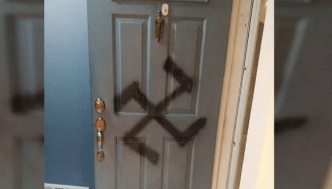 French Jewish woman stabbed in antisemitic attack in Lyon France, swastika painted on door