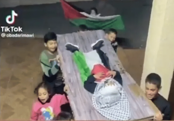 Palestinian Children Playact Funeral Of Shahid